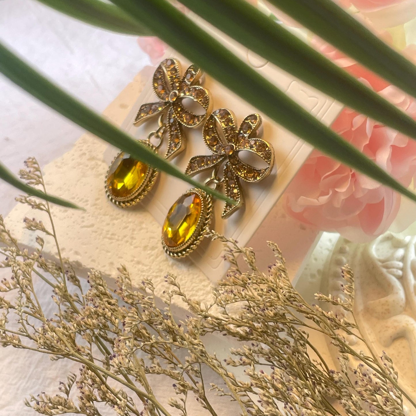 Elegant bow Drop Earrings with rhinestone-encrusted round shapes and yellow ochre oval stones, Vintage luxurious elegant Dangler Earrings