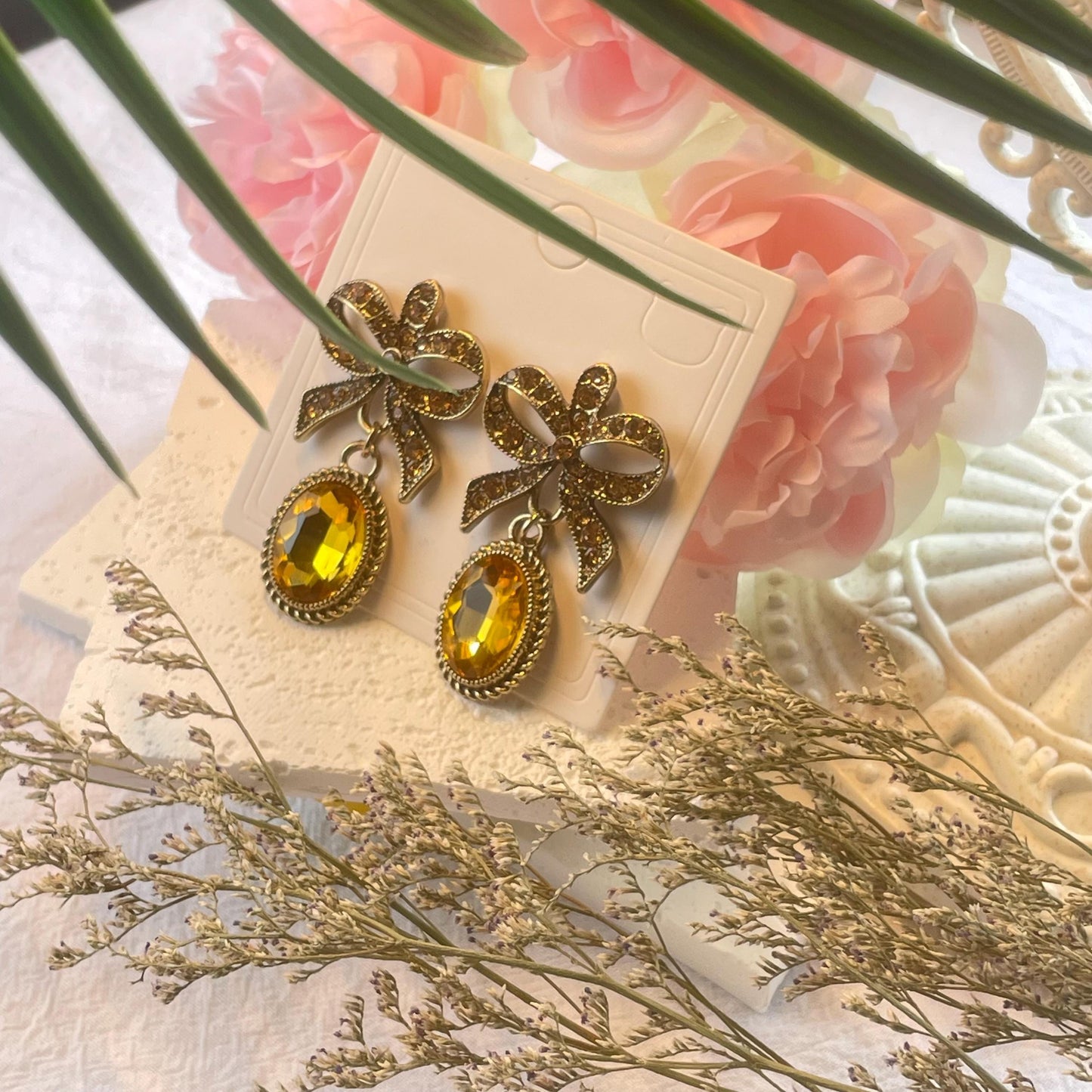 Elegant bow Drop Earrings with rhinestone-encrusted round shapes and yellow ochre oval stones, Vintage luxurious elegant Dangler Earrings